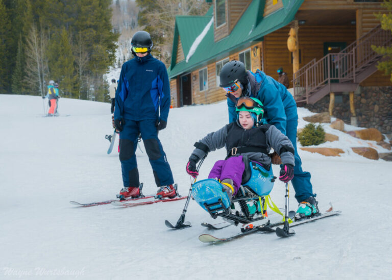 photo of youth in bi-ski