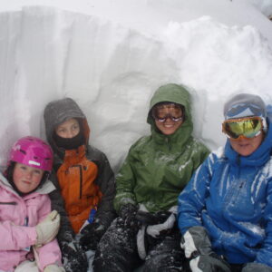 Participants in a snow pit